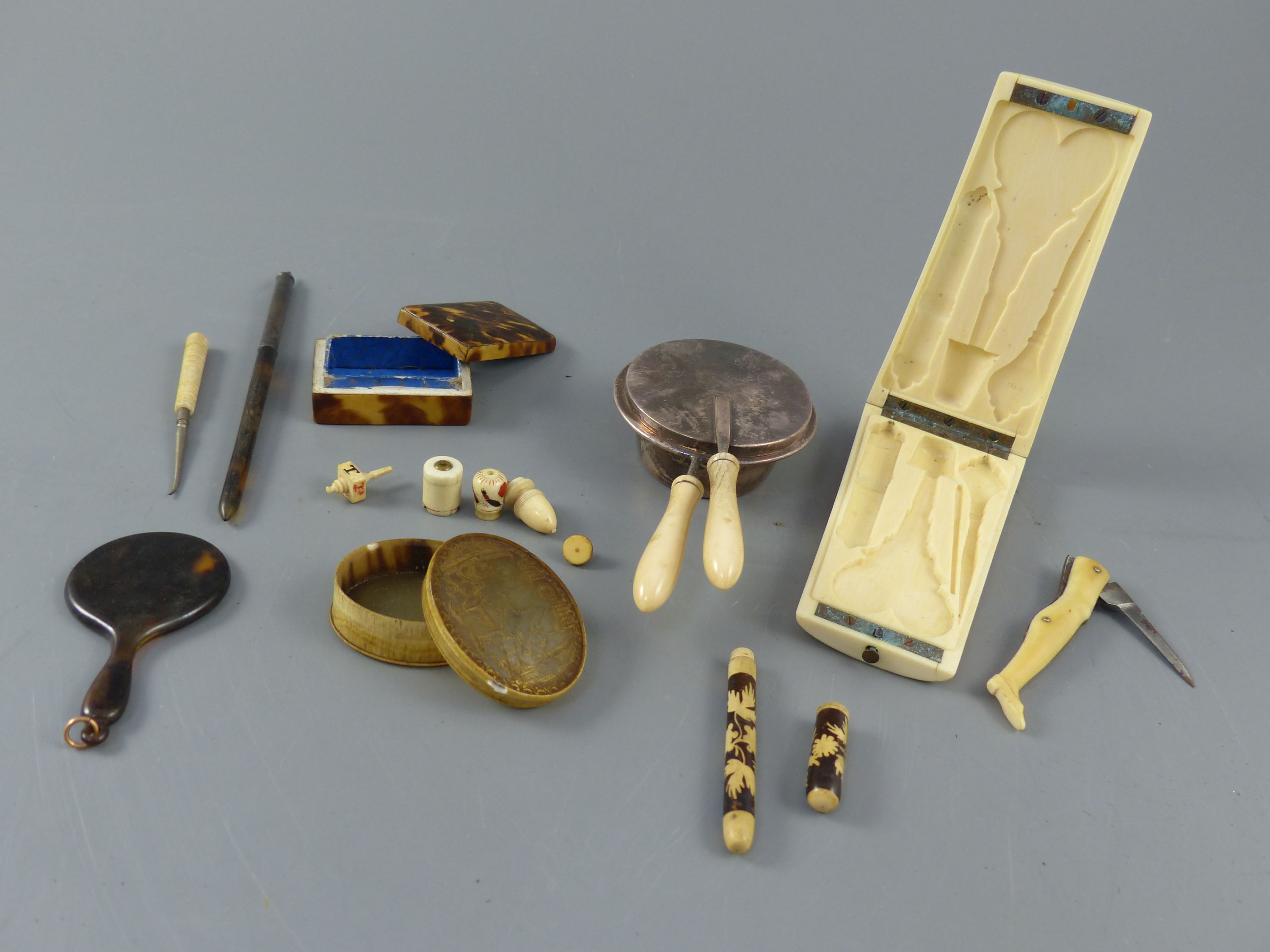 A collection of assorted 18th century and later sewing accessories and objets dart